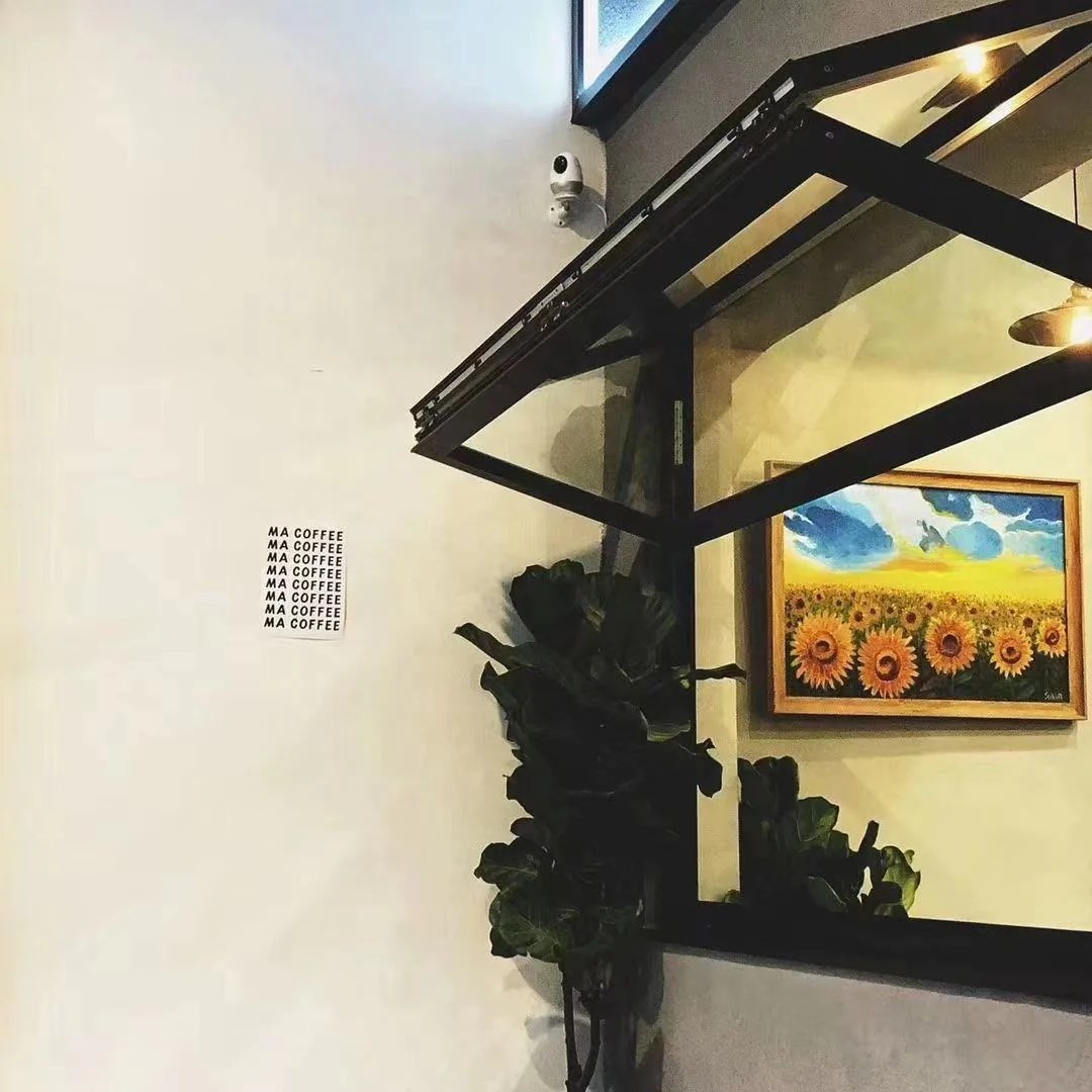 Indoor cafe-style electric fold-up window opened upward